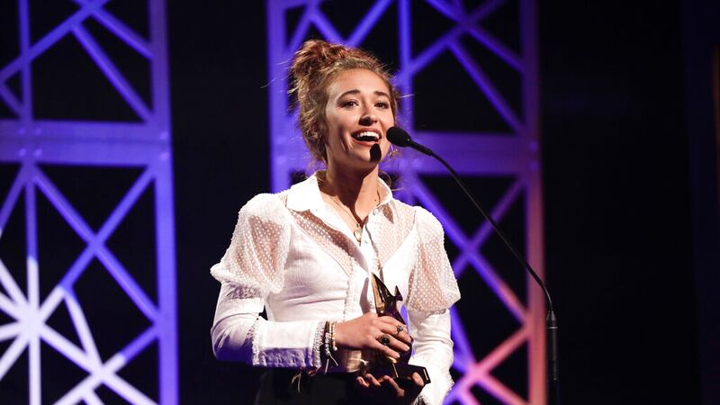 Lauren Daigle accepts the artist of the year award during the Dove Awards on Tuesday, Oct. 15,...