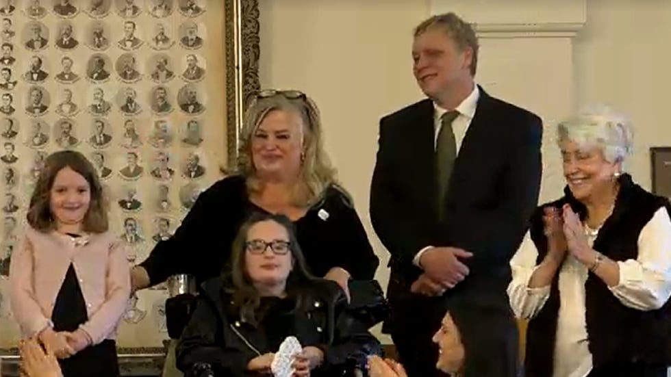 (from left to right) Abby, Pam, Belle, and Chris Andrews, a family from Austin, in the gallery...