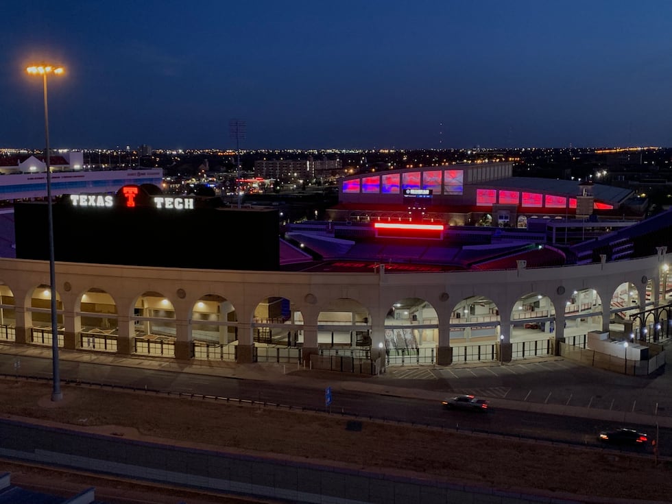 Jones AT&T Stadium lit up to honor USW students on Wednesday night, March 16, 2022.